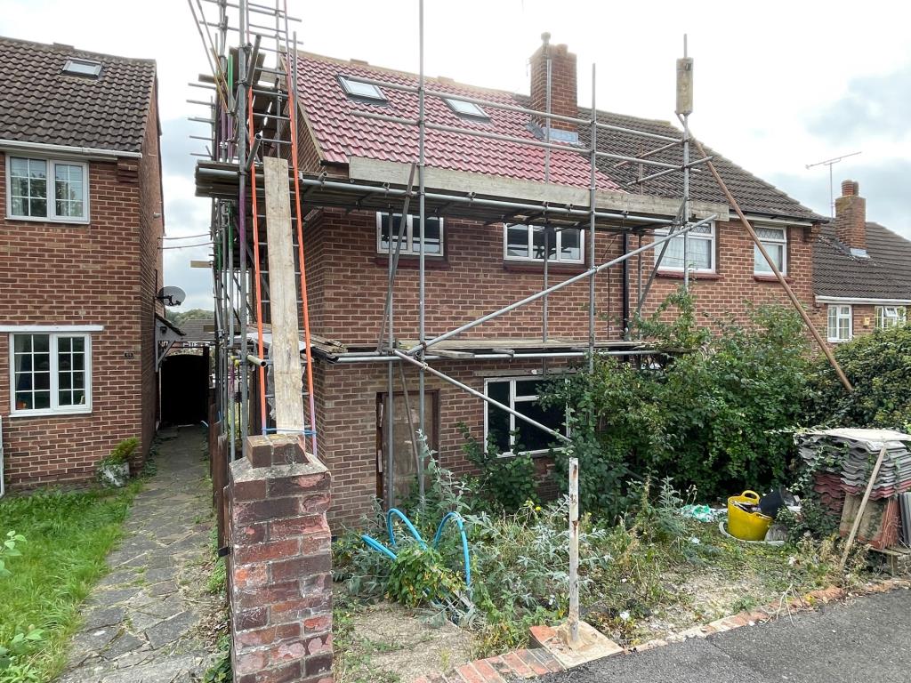 Lot: 134 - SEMI-DETACHED PROPERTY WITH DEVELOPMENT OPPORTUNITY TO BE COMPLETED - Existing front view of 57 Bower Road Hextable